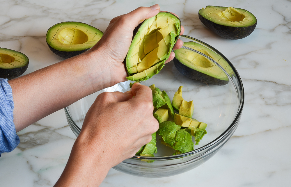 Scooping Avocado pulp